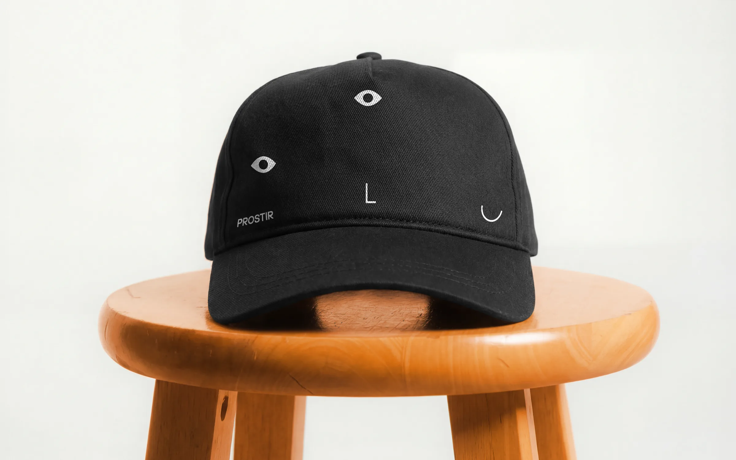 Branded cap on a stool