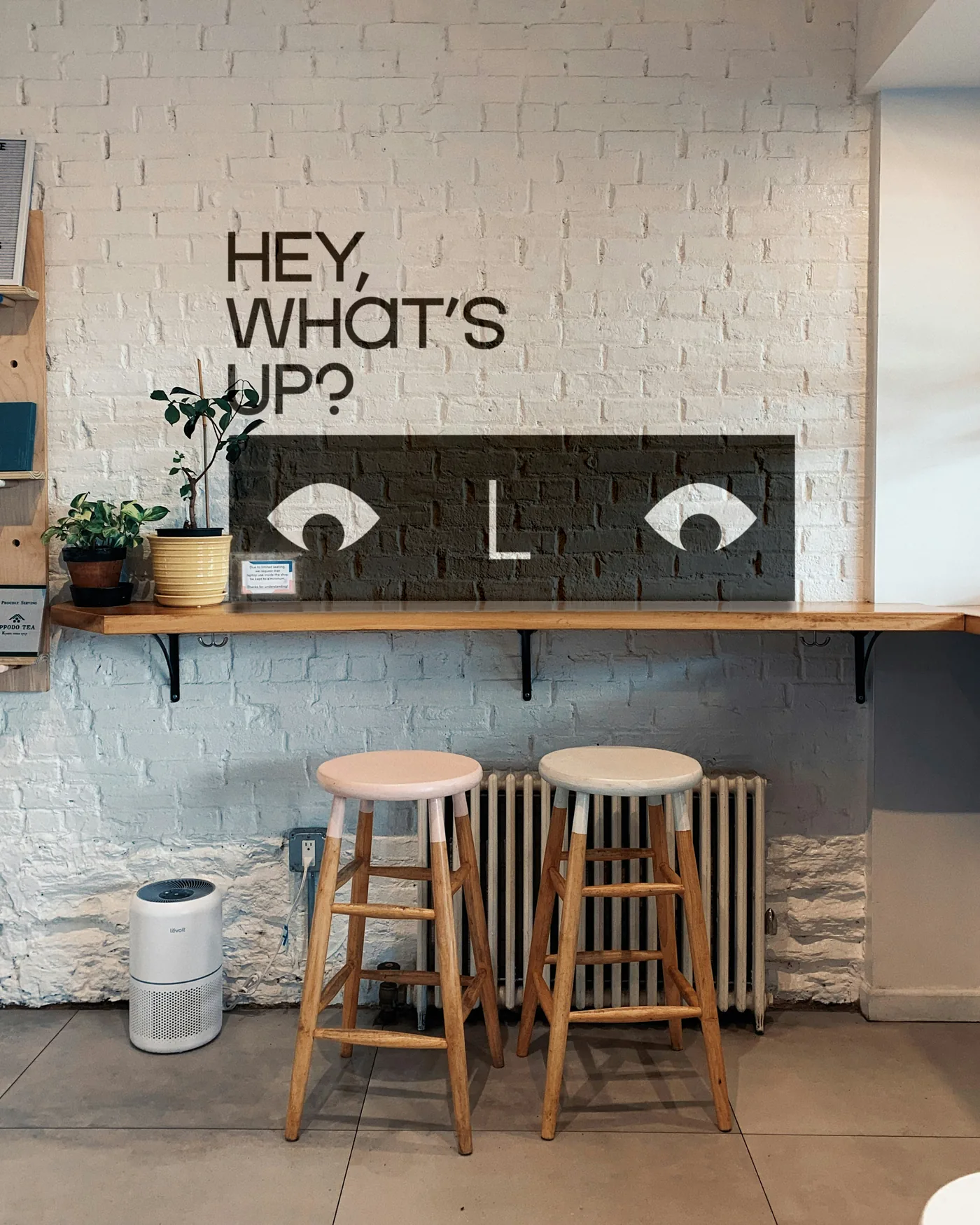 Hub interior with a Hey, what's up? wall