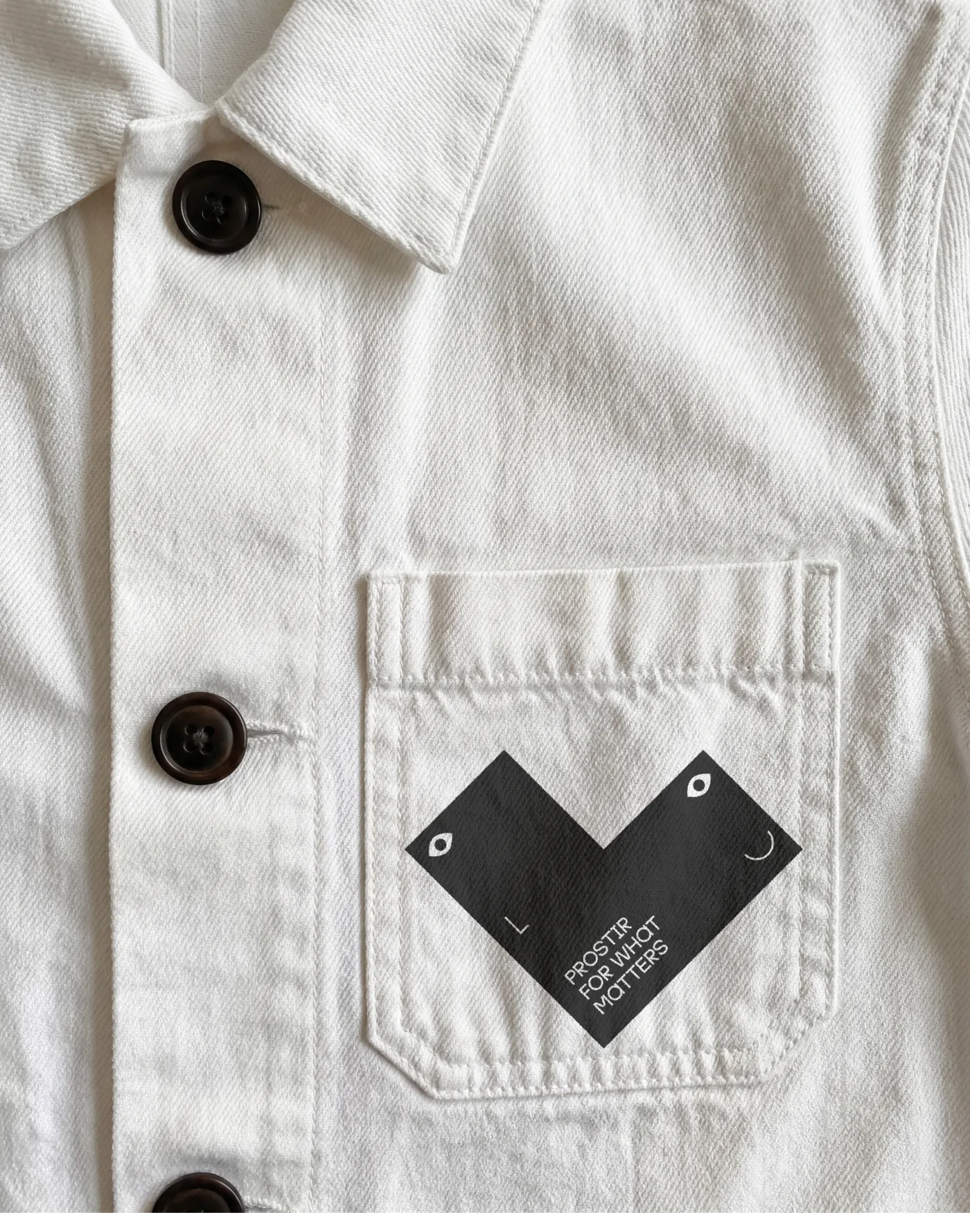 Jacket with an embroidered pocket patch